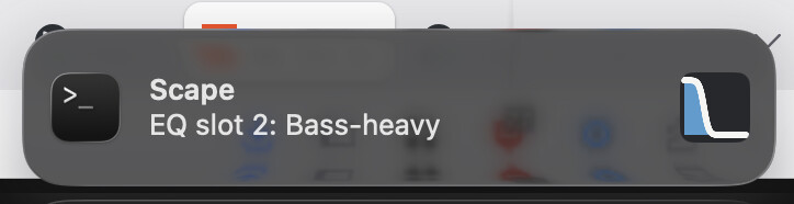 A macOS notification reading "EQ slot 2: Bass-heavy" with a small drawing of the EQ curve