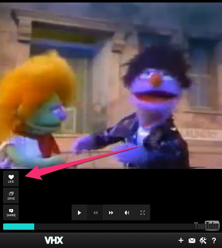 The VHX player in May 2012: a video with Like, Save and Share buttons, playback controls and the VHX bar underneath